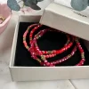 Armbånd Merle – Red mix 1.Stk