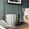 Tekop med guld hank – Beige